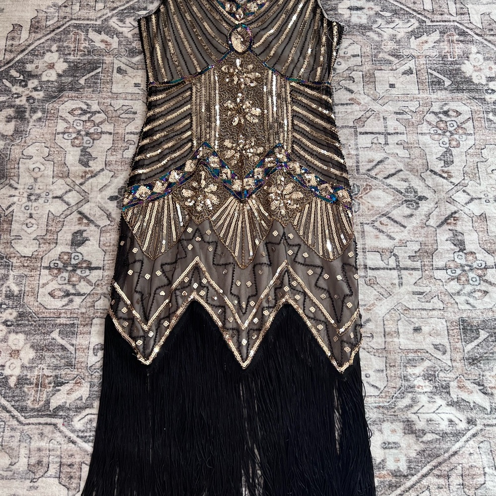 Elegant Black and Gold Embellished Dress